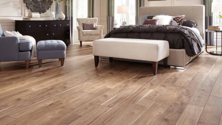 wood look laminate floors in a stylish modern bedroom